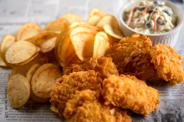 Crispy fried chicken with home-made potato chips and coleslaw