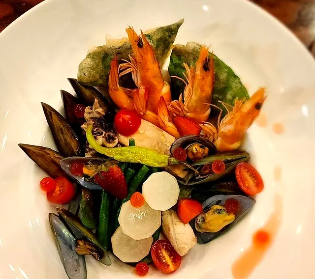 Seafood dish with shrimp, mussels and cherry tomatoes from Hernan's Kitchen
